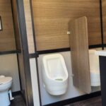 16_ Mens side with stall