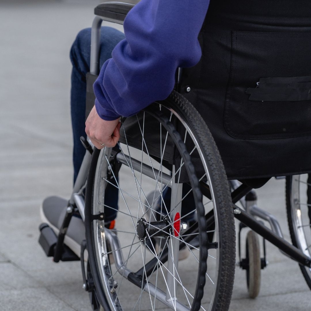 Person in a wheelchair.