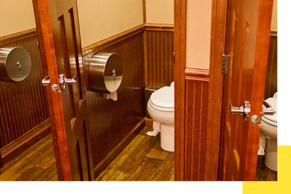 Interior of a clean bathroom stall inside a luxury portable restroom