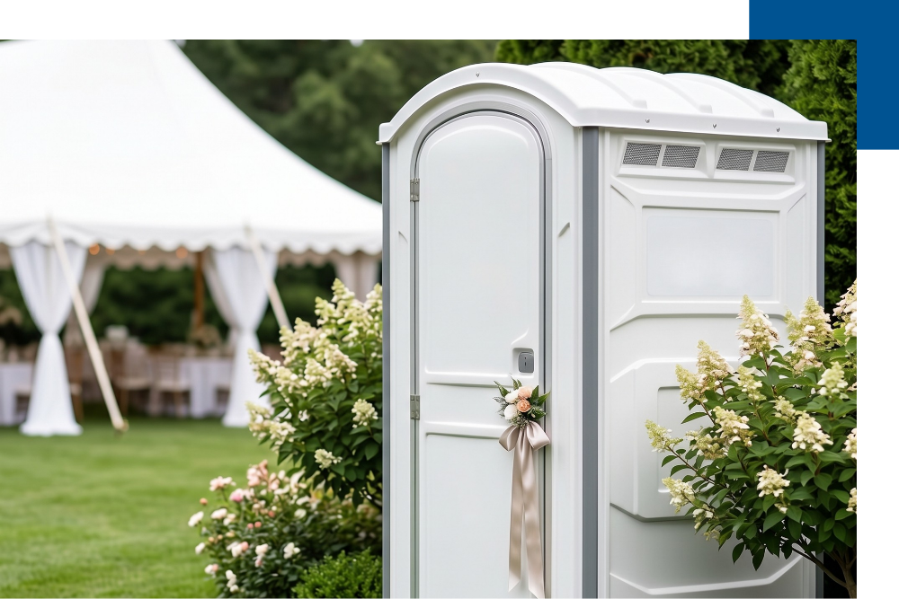 A pristine porta potty unit placed discreetly for a wedding event, showcasing reliable porta potty service Falmouth by Caribou Services.