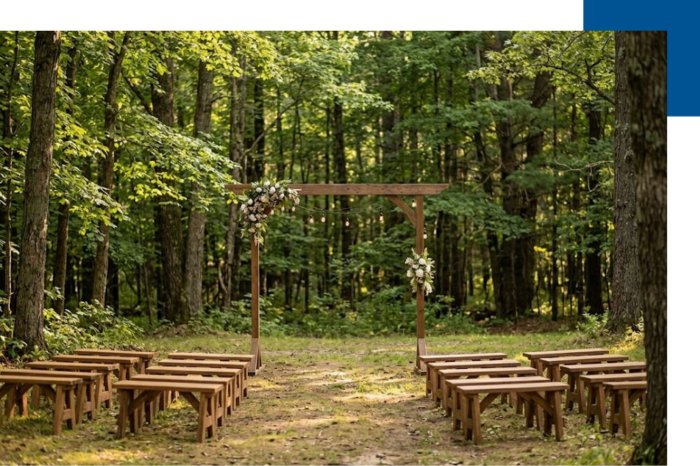 a pristine, scenic woodland wedding ceremony setup with its rustic wooden arch in the Manistee National Forest